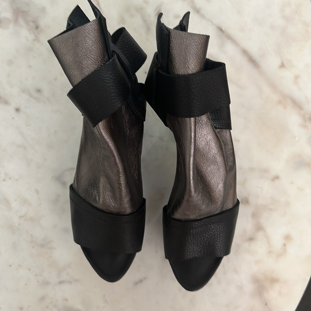 New without tags trippen booties . Perfect condition. Black /platinum metallic
